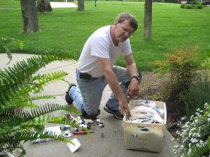 a Mansfield Irrigation tech prepares to install a new drip line