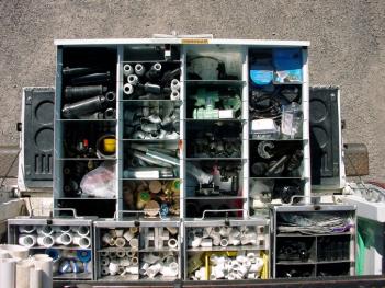 Neatly organized equipment and parts for sprinkler repair in Mansfield, TX